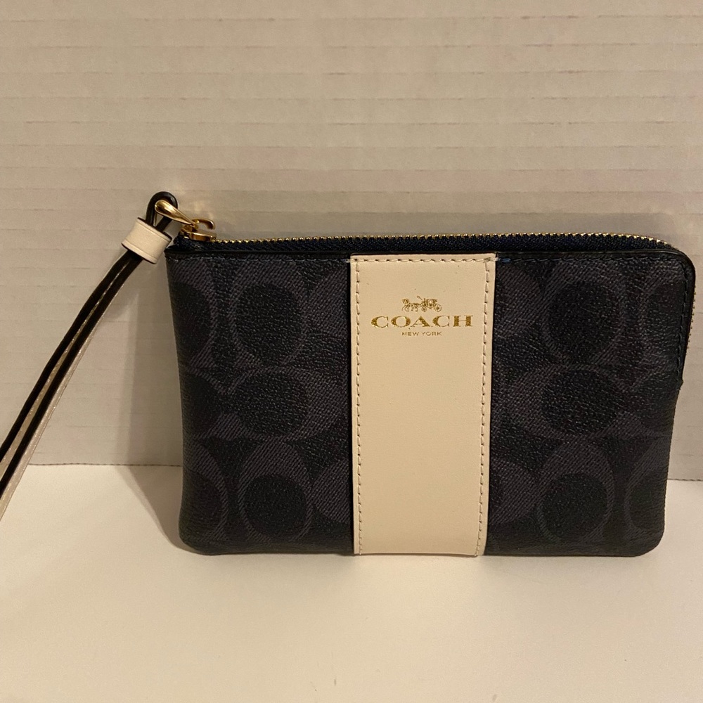 EUC Coach PVC Small Wristlet in ‘denim’ color